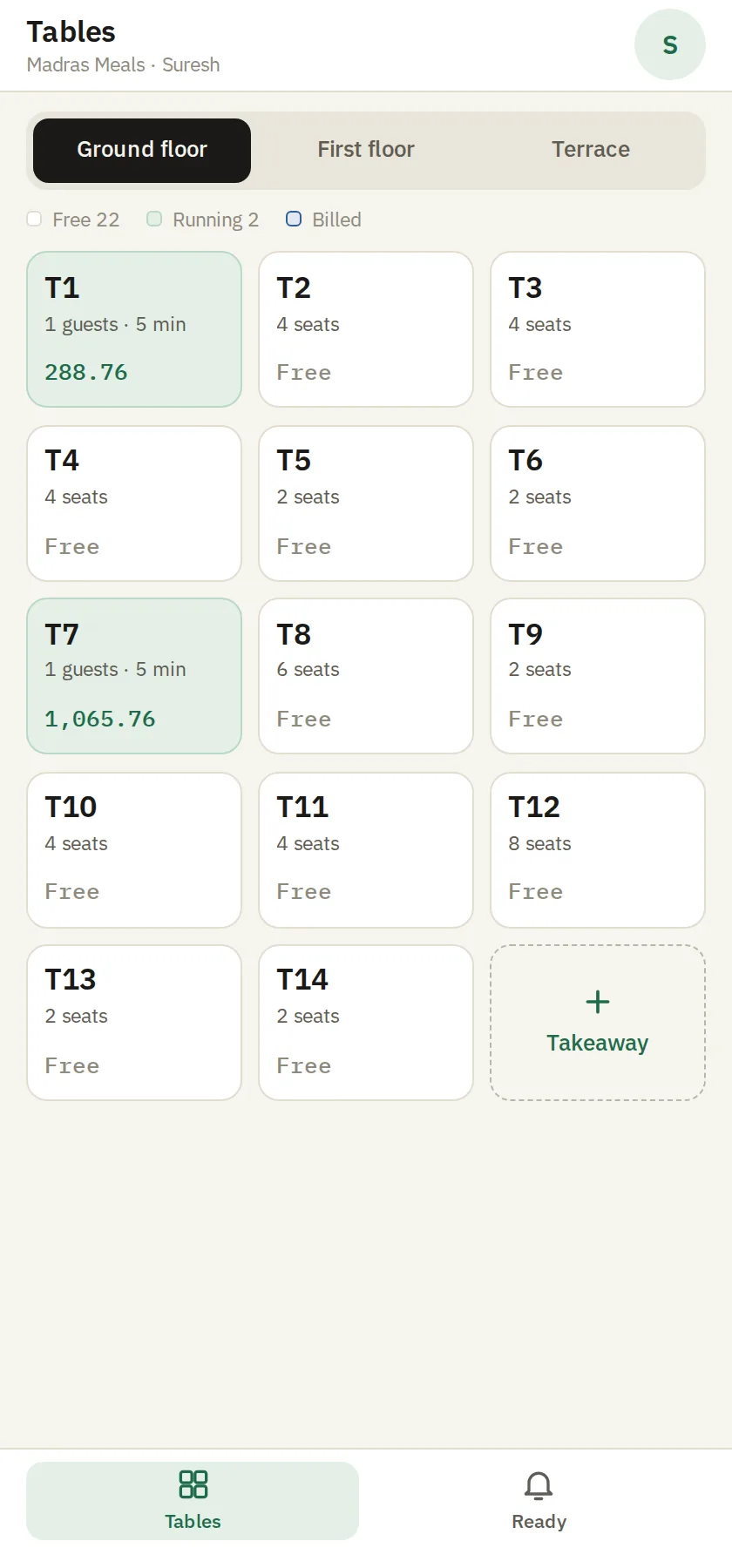 The SmartPOS waiter app on a phone, showing the ground-floor tables with two running